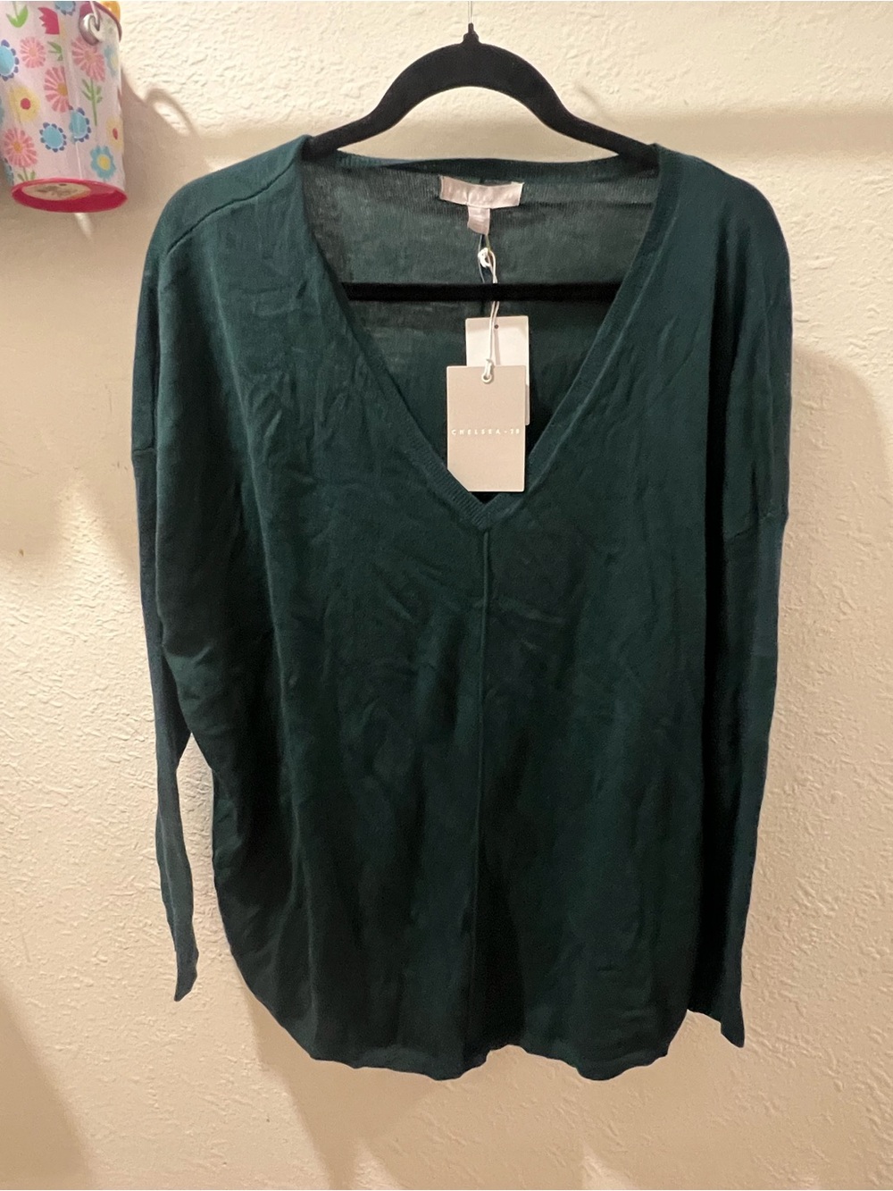 Chelsea28 Oversize V-Neck High/Low Sweater in a deep green/